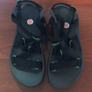 Never worn Teva sandals, black with green